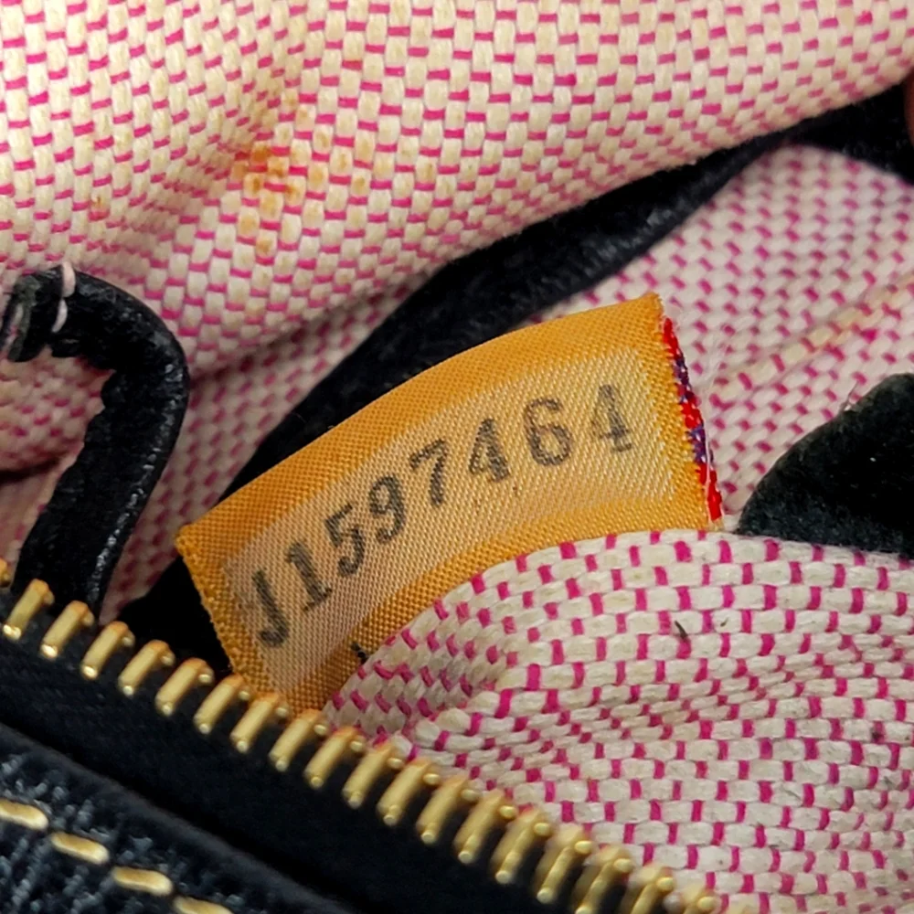 Dooney & Bourke Black Leather Crossbody Bag. P127‎